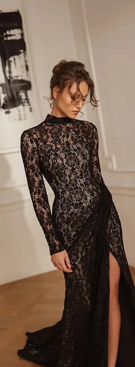 Model wearing a black gown and posing